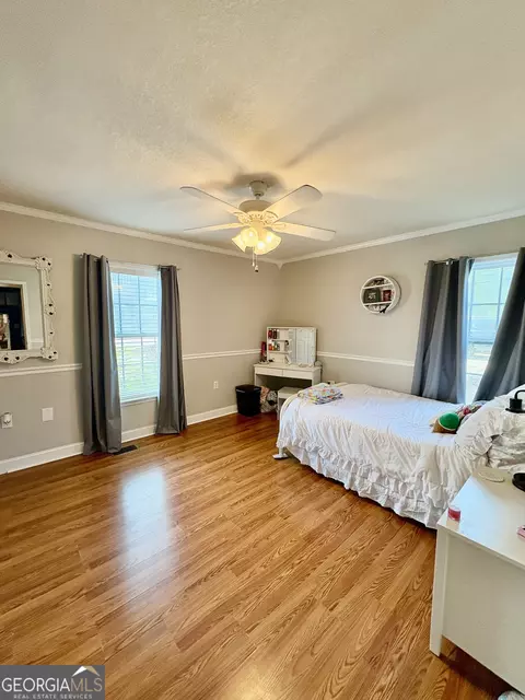 Bedroom - 348 S Victory Dr, Lyons, GA 30436 photo 3 of 6