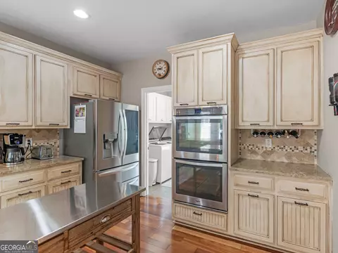 Kitchen - 221 Hummingbird Ct, Hampton, GA 30228 photo 3 of 9