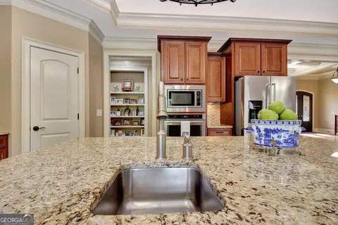 Kitchen - 100 Wickham Dr, Tyrone, GA 30290 photo 8 of 11
