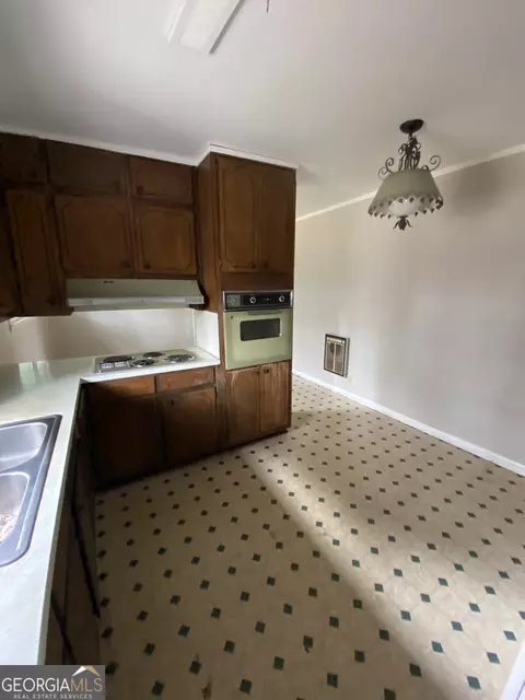 Kitchen - 1409 Laboon Rd, Monroe, GA 30655 photo 3 of 3