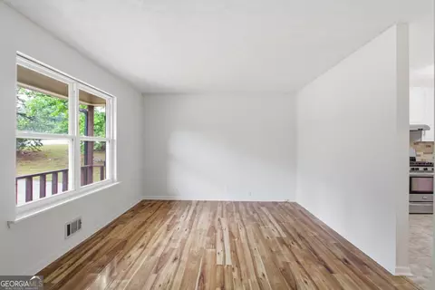 Living - 3936 Rolling Pl, Conley, GA 30288 photo 3 of 3