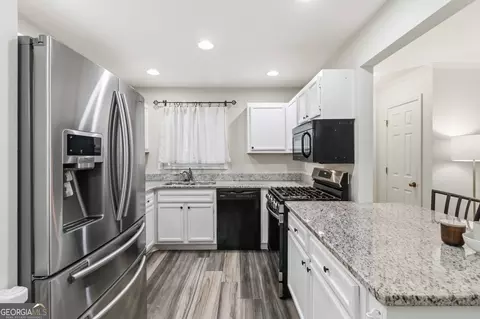 Kitchen - 606 Berkeley Woods Dr, Duluth, GA 30096 photo 2 of 2