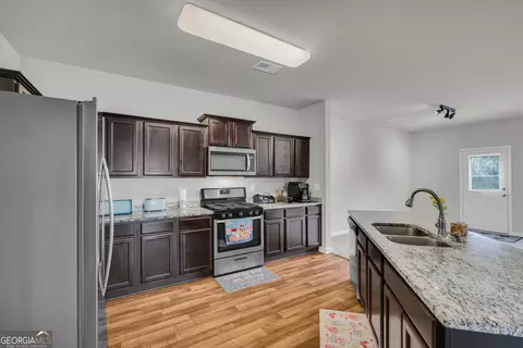 Kitchen - 439 Fall Ct, Pendergrass, GA 30567 photo 2 of 2