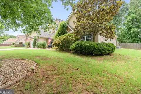 Exterior - 235 Creekside Cir, Hampton, GA 30228 photo 5 of 11