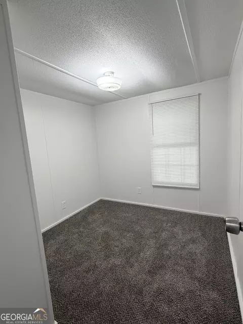 Bedroom - 408 Register St, Dexter, GA 31019 photo 2 of 3