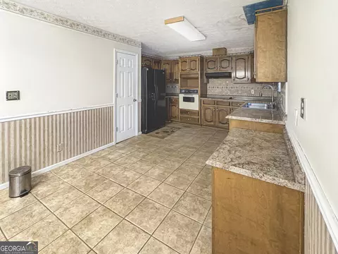 Kitchen - 360 Floyd Rd, Hampton, GA 30228 photo 2 of 2