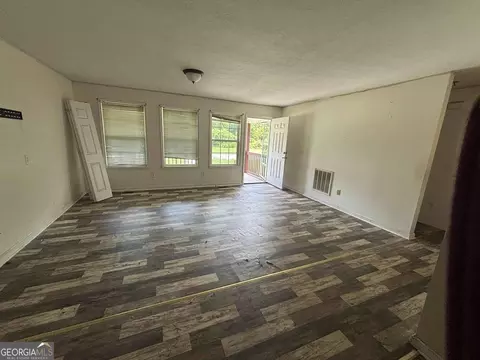 Living - 431 2nd St, Thomson, GA 30824 photo 1 of 2