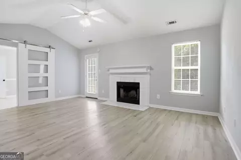 Living - 11190 Knotty Pine Pl, Hampton, GA 30228 photo 4 of 6