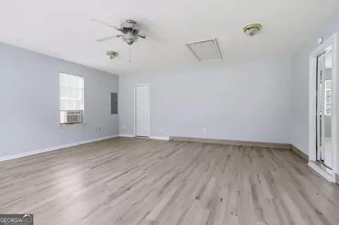Living - 11190 Knotty Pine Pl, Hampton, GA 30228 photo 6 of 6