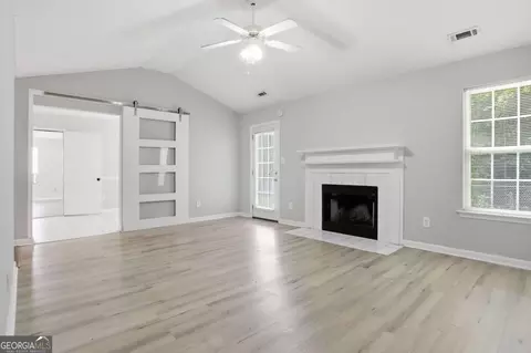 Living - 11190 Knotty Pine Pl, Hampton, GA 30228 photo 3 of 6