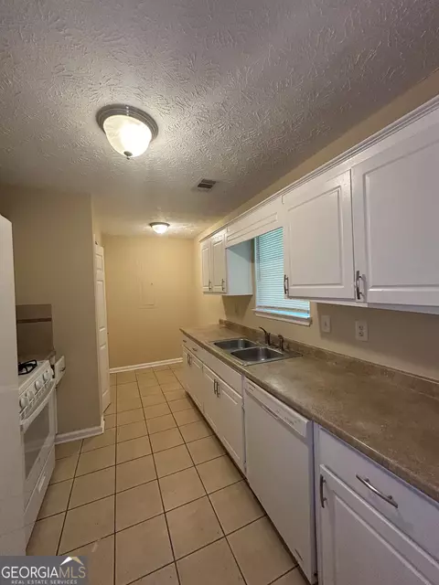 Kitchen - 225 Wagon Wheel Dr, Rex, GA 30273 photo 2 of 2