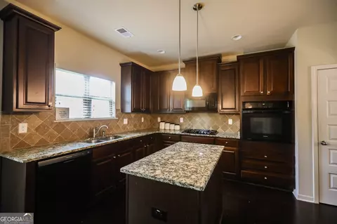 Kitchen - 225 Silver Ridge Rd, Covington, GA 30016 photo 2 of 3