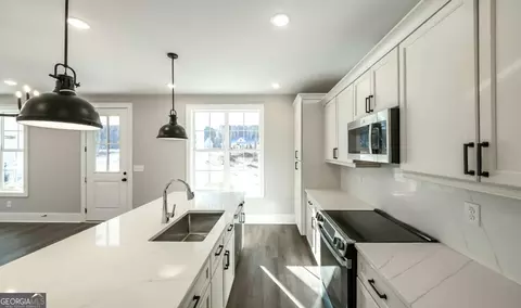 Kitchen - 479 West Ave, Bowdon, GA 30108 photo 2 of 2