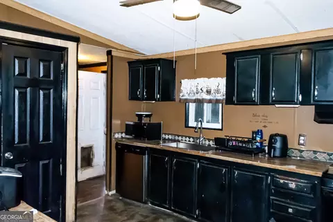 Kitchen - 230 Norfolk Dr, Hampton, GA 30228 photo 2 of 2