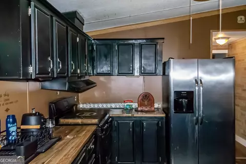 Kitchen - 230 Norfolk Dr, Hampton, GA 30228 photo 1 of 2