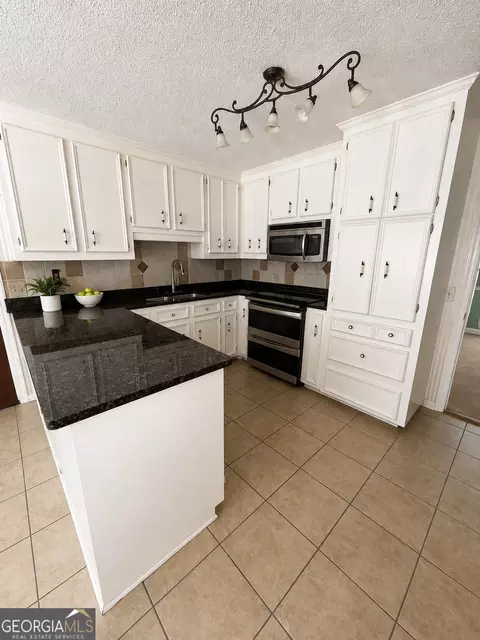 Kitchen - 311 Castlegate Rd, Macon, GA 31210 photo 2 of 2