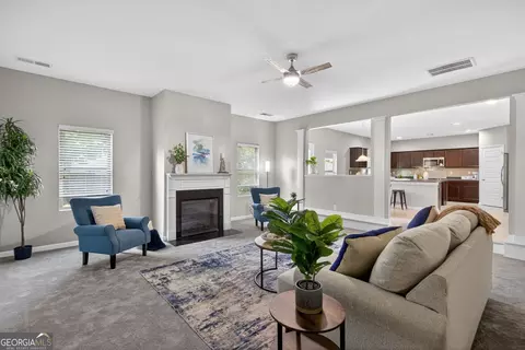 Living - 311 Hillcrest Ct, Hampton, GA 30228 photo 2 of 2