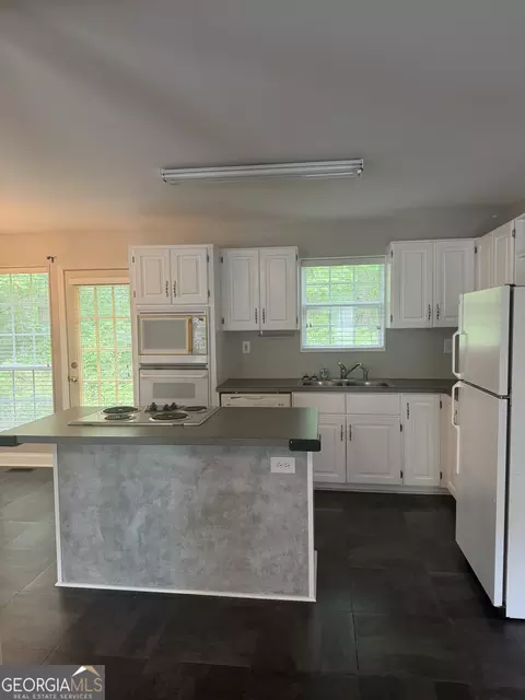 Kitchen - 406 Covered Bridge Rd, Covington, GA 30016 photo 3 of 5