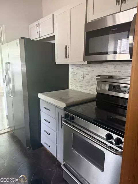 Kitchen - 406 Covered Bridge Rd, Covington, GA 30016 photo 5 of 5