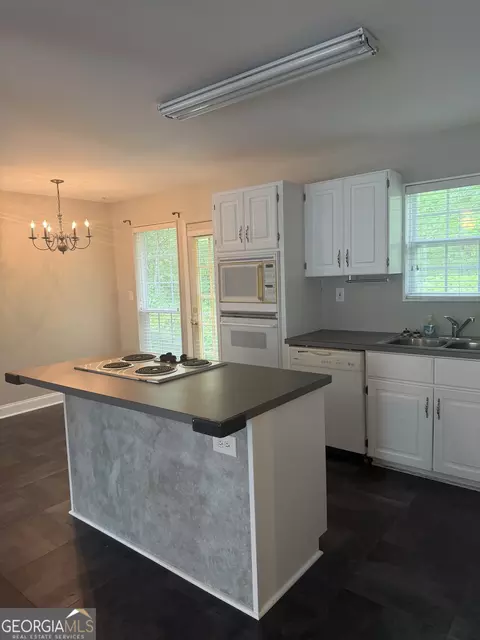 Kitchen - 406 Covered Bridge Rd, Covington, GA 30016 photo 4 of 5