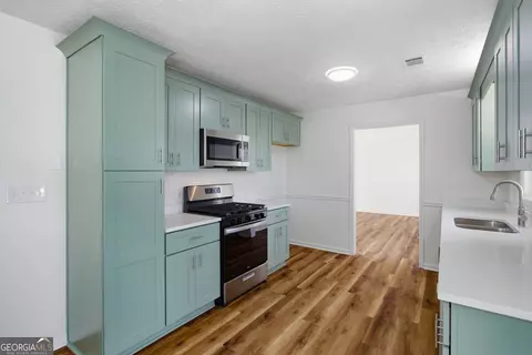 Kitchen - 290 The Falls Blvd, Covington, GA 30016 photo 2 of 3