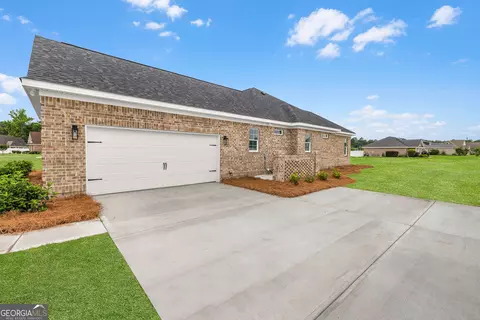 Exterior - 120 Stadium Dr, Guyton, GA 31312 photo 6 of 15