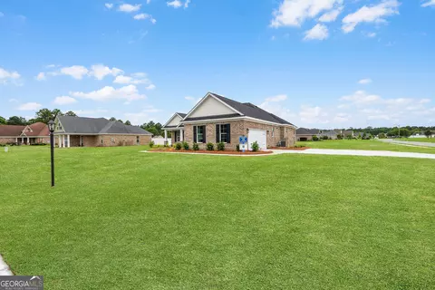 Exterior - 120 Stadium Dr, Guyton, GA 31312 photo 4 of 15