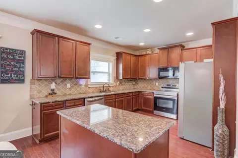 Kitchen - 341 Chandler Bluff Ct, Grayson, GA 30017 photo 2 of 3
