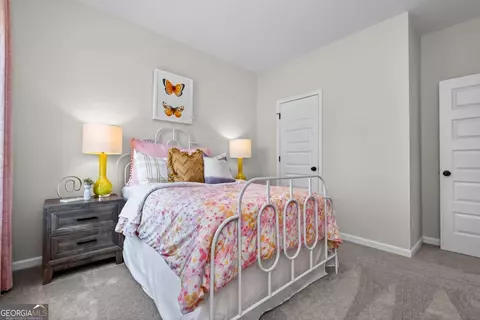 Bedroom - 1409 Trellis Ct #LOT 12, Hampton, GA 30228 photo 9 of 13