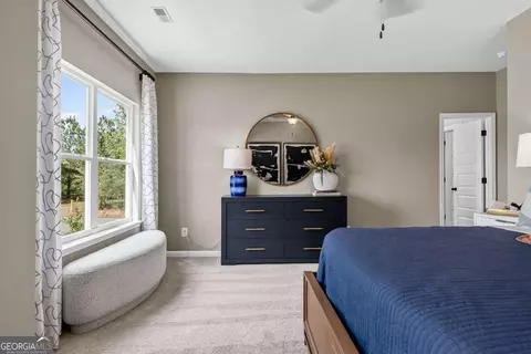 Bedroom - 1409 Trellis Ct #LOT 12, Hampton, GA 30228 photo 7 of 13
