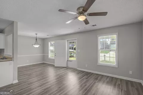 Living - 1509 N Hampton Ct, Hampton, GA 30228 photo 2 of 3