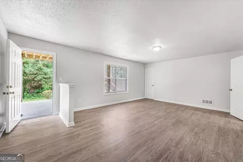 Living - 1312 Vine Cir, Mcdonough, GA 30253 photo 6 of 7