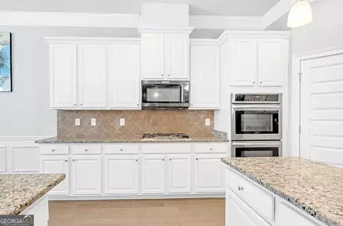 Kitchen - 4580 Cloister Cir, Hampton, GA 30228 photo 4 of 4