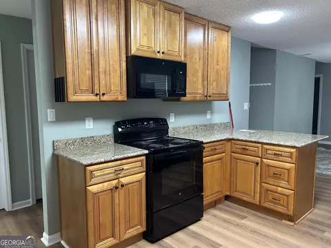 Kitchen - 111 Mockingbird Dr, Dublin, GA 31021 photo 4 of 12