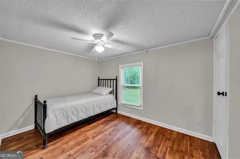 Bedroom - 170 Gary Brewer Rd, Cobb, GA 31735 photo 5 of 9