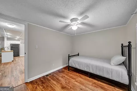 Bedroom - 170 Gary Brewer Rd, Cobb, GA 31735 photo 6 of 9