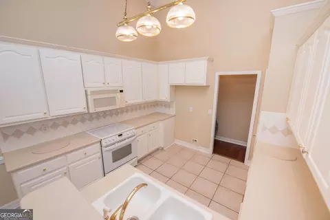 Kitchen - 107 Arbor Ln, Centerville, GA 31028 photo 7 of 8