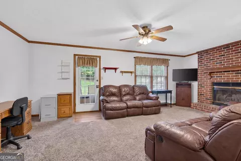 Living - 149 Olde Hampton Way, Hampton, GA 30228 photo 1 of 4