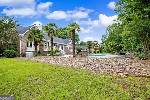 Exterior - 13700 Hughes Xing, Hampton, GA 30228 photo 5 of 13