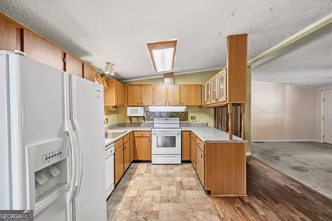 Kitchen - 188 Deptula Rd, Jackson, GA 30233 photo 2 of 7