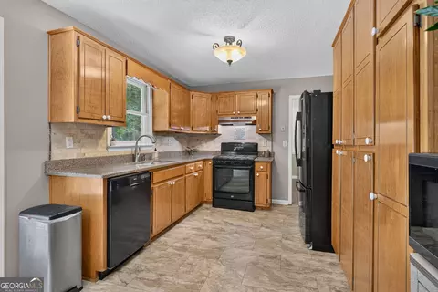 Kitchen - 275 Pine Tree Ln, Mcdonough, GA 30252 photo 2 of 2