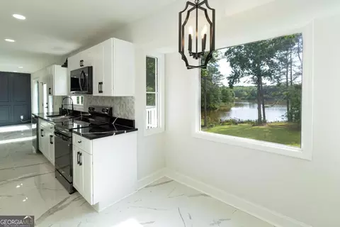 Kitchen - 60 Lakeside Dr, Covington, GA 30016 photo 2 of 3