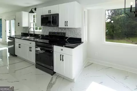 Kitchen - 60 Lakeside Dr, Covington, GA 30016 photo 1 of 3