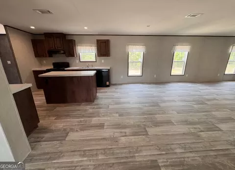 Living - 516 Mosley Bridge Rd, Claxton, GA 30417 photo 2 of 3