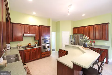 Kitchen - 12216 Edgewater Dr, Hampton, GA 30228 photo 3 of 4