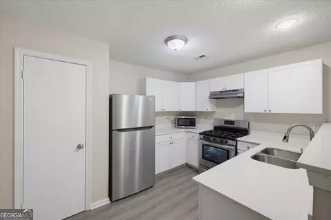 Kitchen - 440 Cowan Rd, Covington, GA 30016 photo 2 of 3