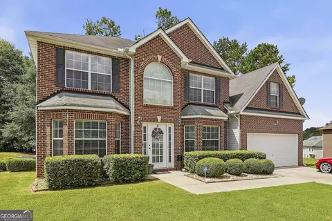 Exterior - 310 Megan Dr, Hampton, GA 30228 photo 3 of 11