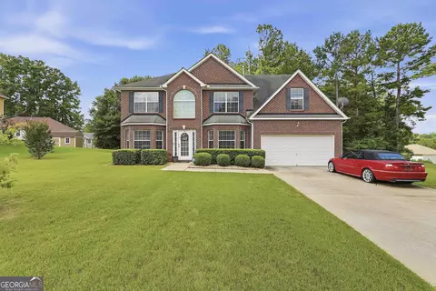 Exterior - 310 Megan Dr, Hampton, GA 30228 photo 2 of 11