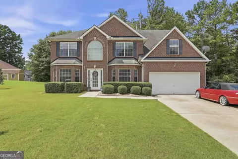 Exterior - 310 Megan Dr, Hampton, GA 30228 photo 4 of 11