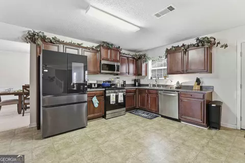 Kitchen - 310 Megan Dr, Hampton, GA 30228 photo 3 of 3